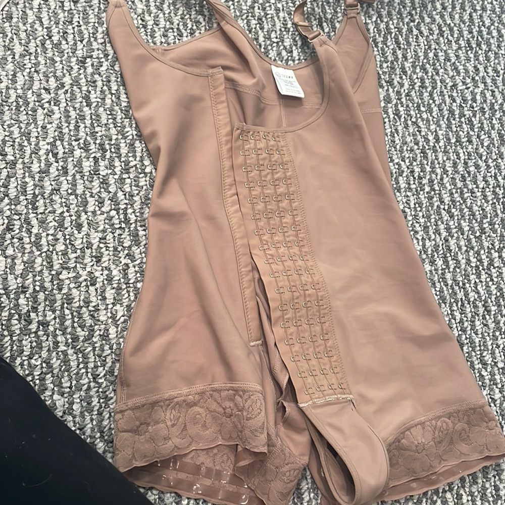 Bring New Girdle never used ripped the tag off by accident no pets